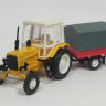 Трактор МТЗ-82 (пластмасса) с прицепом тент(МаркАвто) 1:43